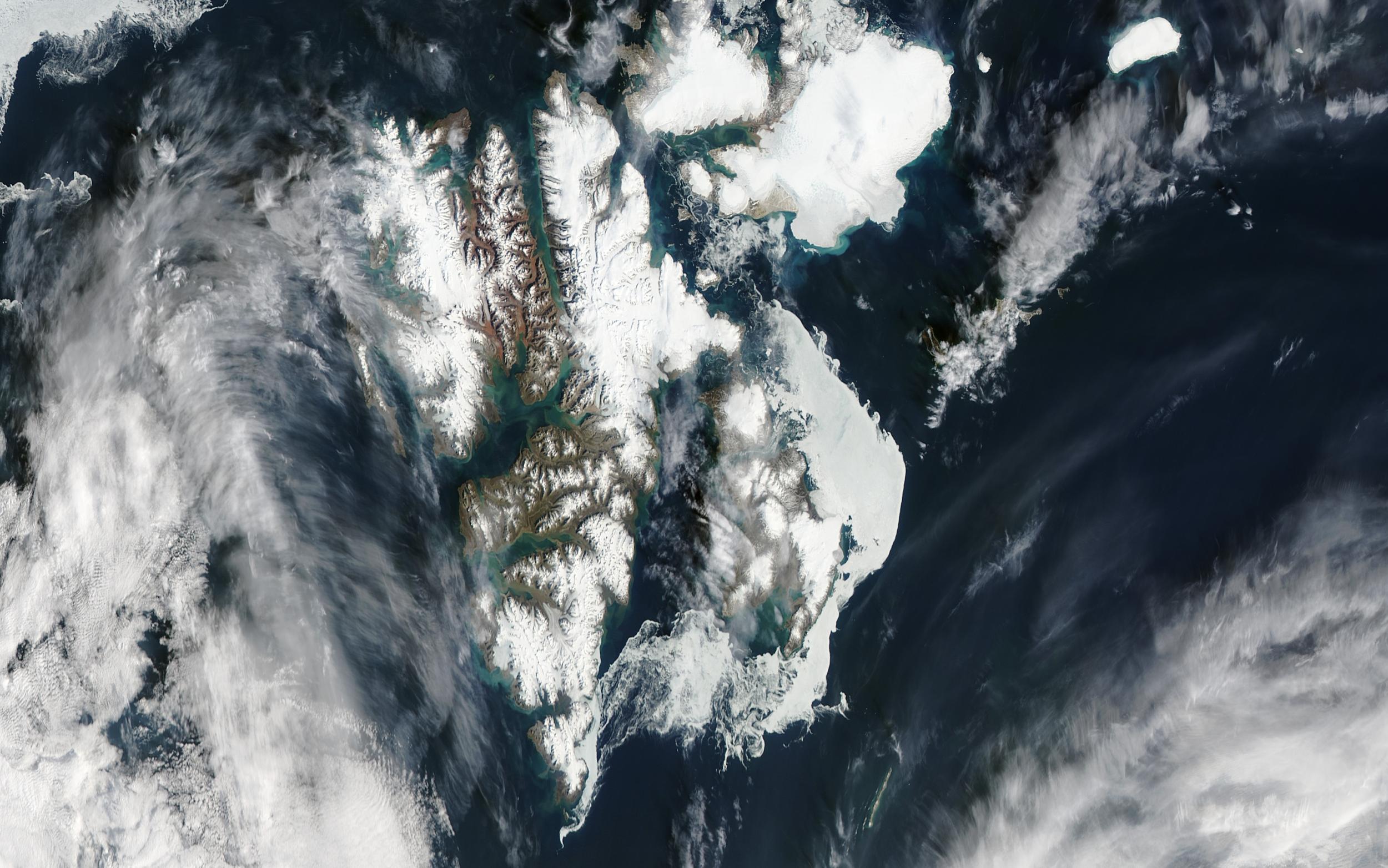 The Svalbard archipelago, imaged on August 9, 2015 by the the Moderate Resolution Imaging Spectroradiometer (MODIS) on NASA’s Aqua satellite.